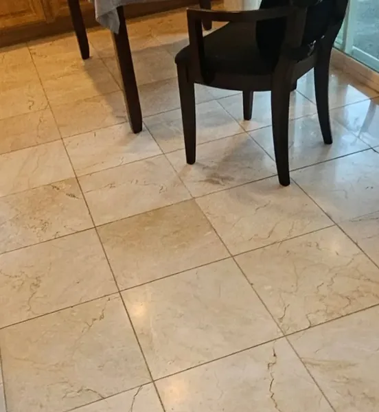 Crema marfil marble floor looking dull before polishing