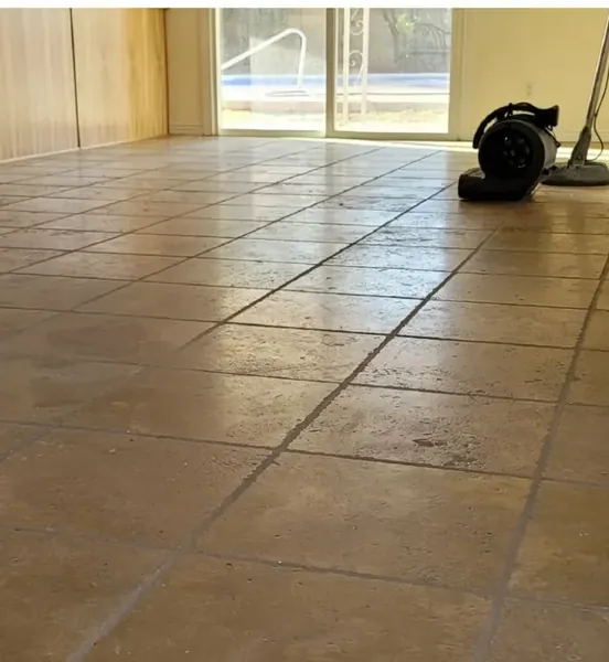 Travertine tile floor looking dull before cleaning